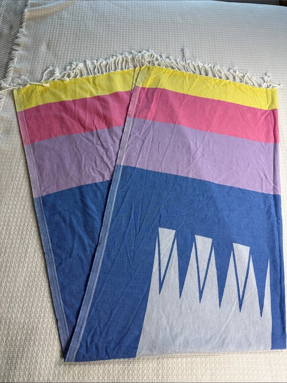 Fun colorful cotton tablecloth with corded fringe blue, white, pink, and yellow